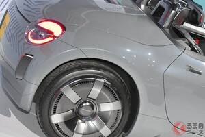 ダイハツ新「“FR”スポーツカー」世界初公開！ 軽ボディ×「“初代オマージュ”の丸目ライト」採用の2人乗り仕様！ 「世界で唯一のパッケージ」濃厚の次期型を示唆する「K-OPEN」について聞いてみた