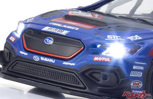 ピカっとライトが点灯するスバルWRXを拳で味わい尽くせ!!  ニュルブルクリンク24時間レースの雰囲気を京商が綴じ込む!　コンビニでも買えるぞ!!